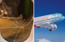 Mulher mostrar momento exato da quebra da janela do avião