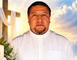 Padre é encontrado morto ao lado de cartaz com ameaças